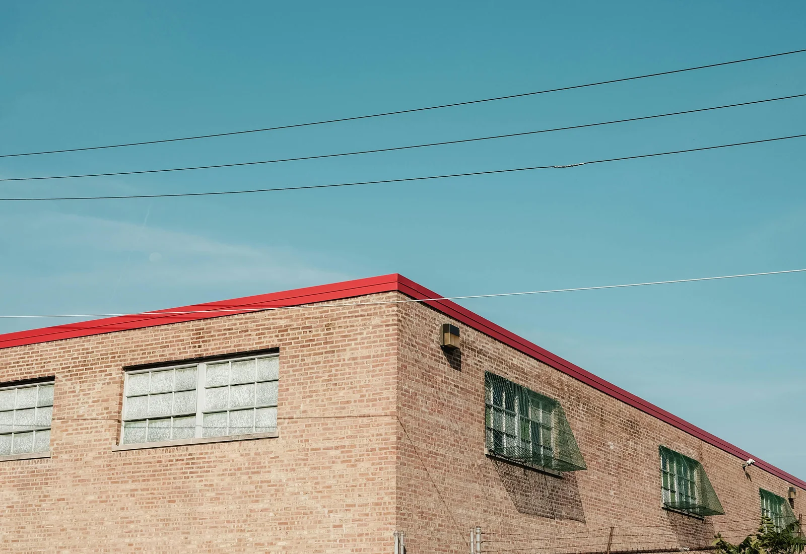 Areas We Serve 4 Commercial roofing service area closing skyline and fleet image