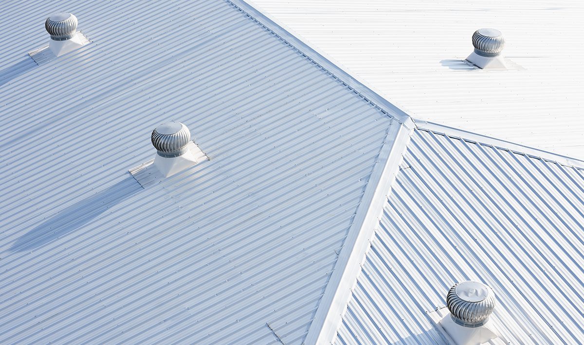 Metal Sheet Roofing On Commercial Construction With Blue Sky