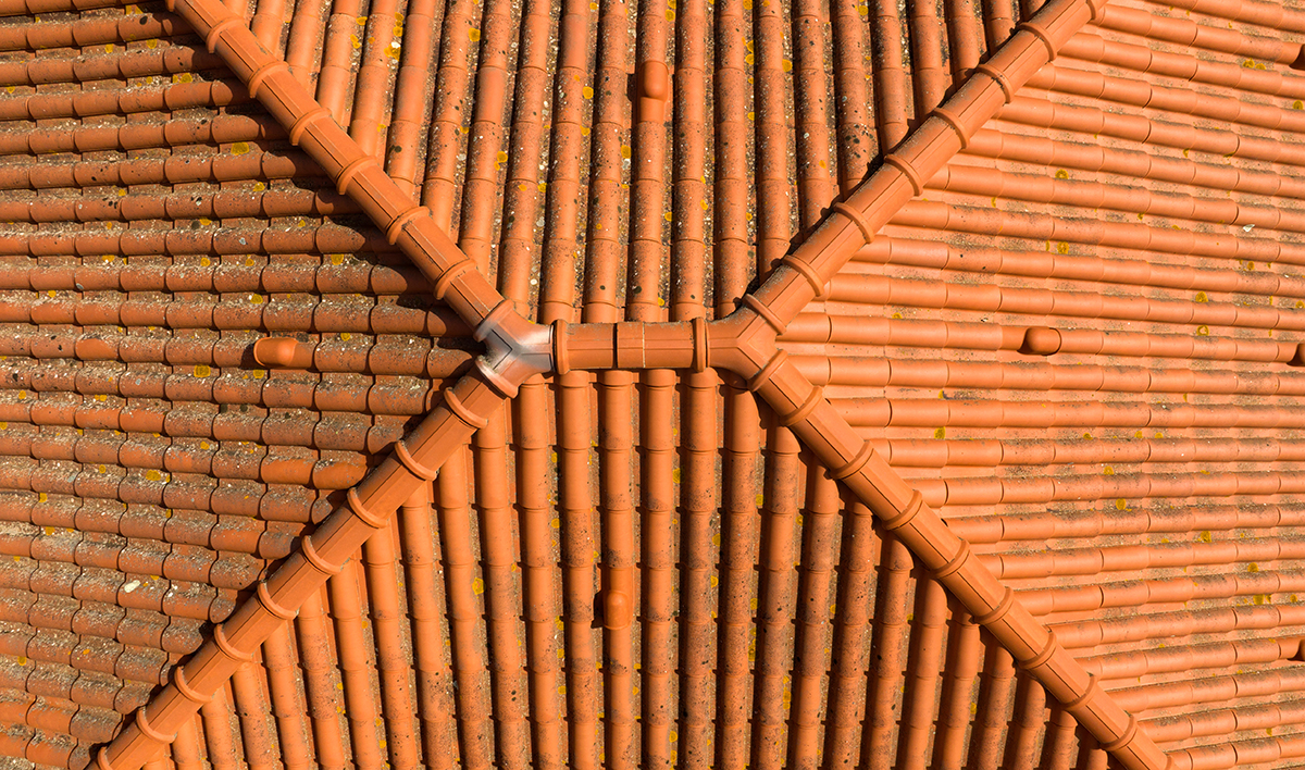 Aerial Zenithal View On A Sloping Roof With Orange Tiles