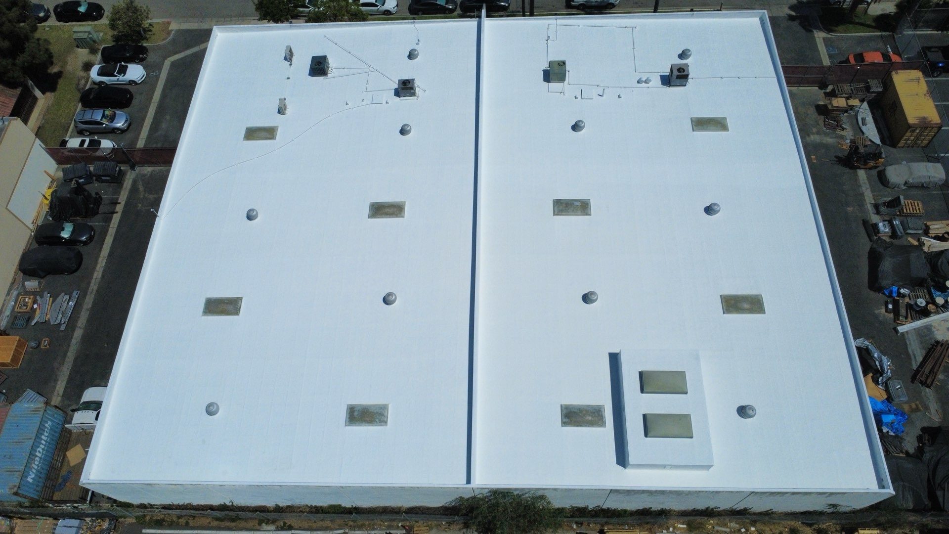 Aerial after photo of the recoated white elastomeric roof on the Long Beach warehouse