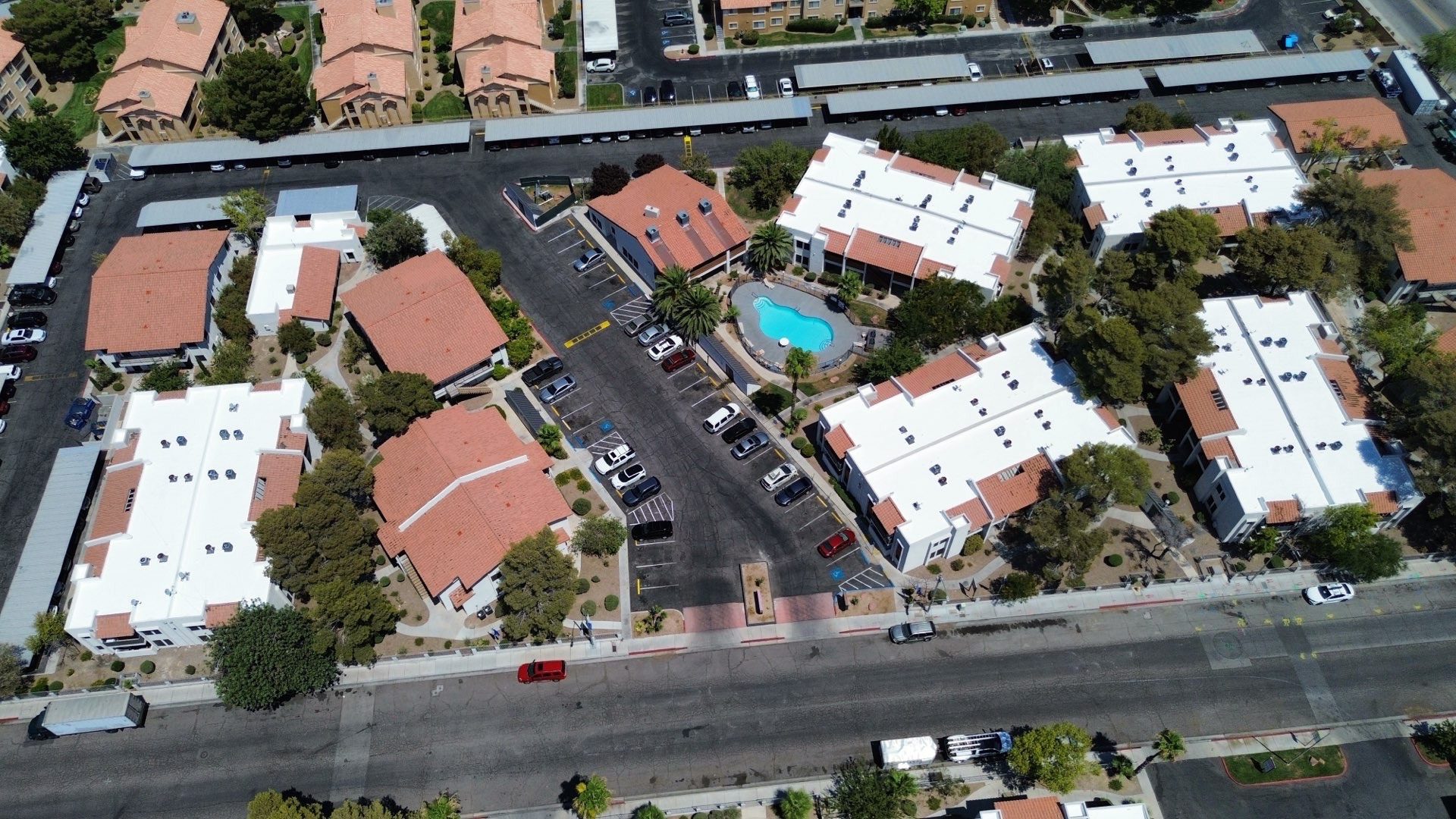 Aerial after photo of the recoated white roofs across the Las Vegas apartment community