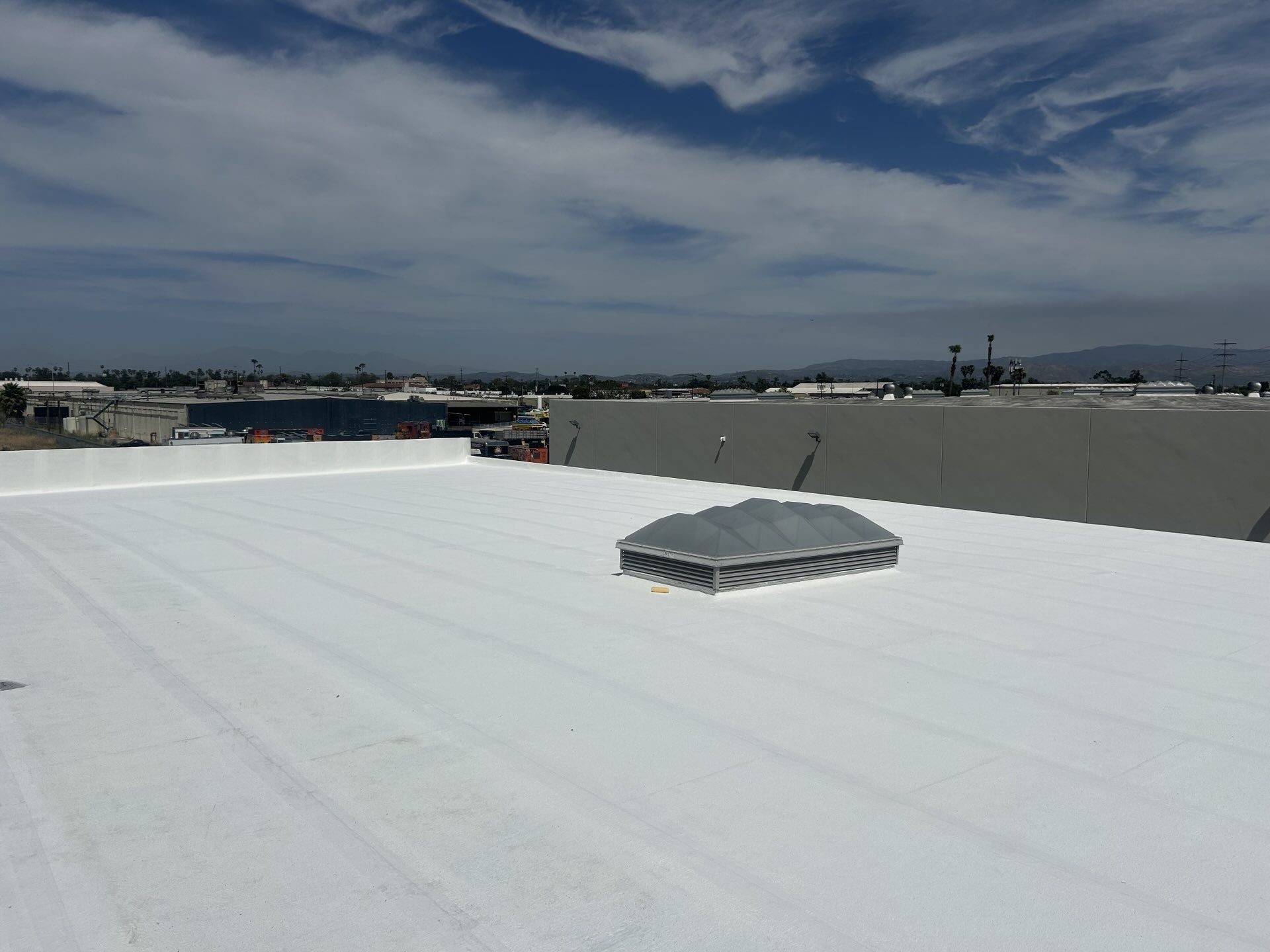 After photo of the recoated white elastomeric roof on the Santa Ana warehouse