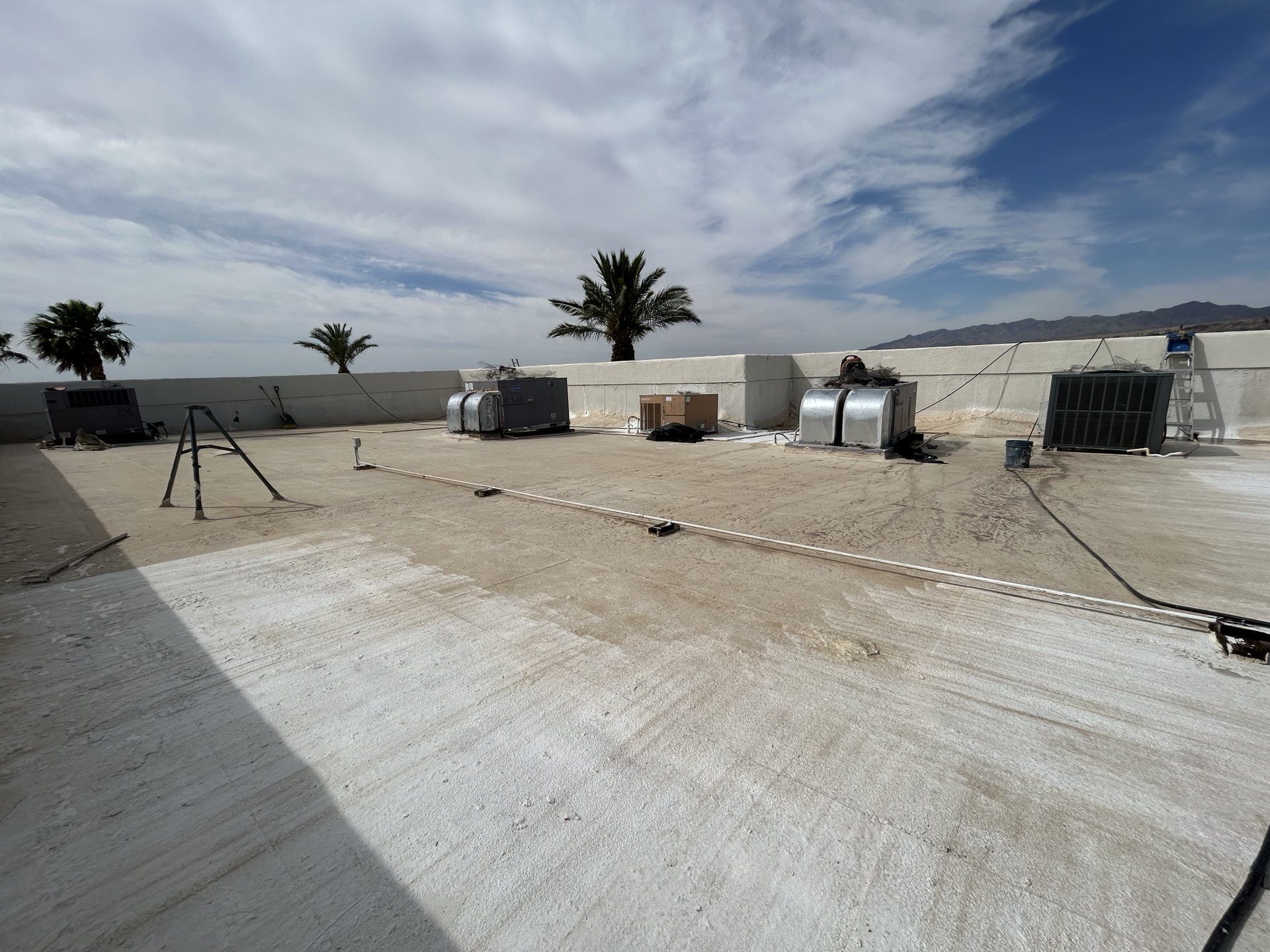 Before photo of an aging cap sheet roof on a Laughlin commercial building prior to restoration