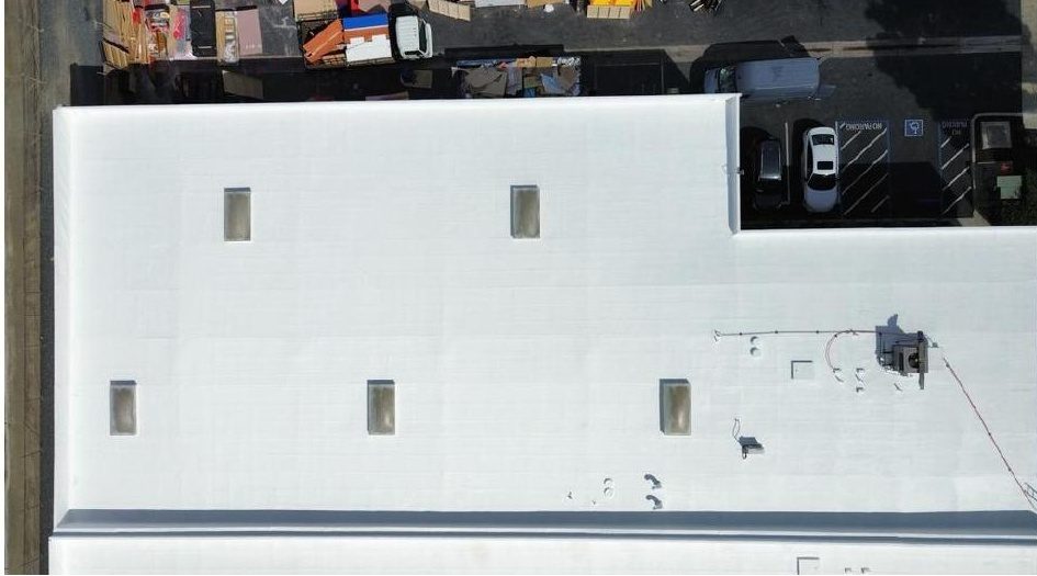 Aerial before photo of an Anaheim warehouse roof prior to recoating