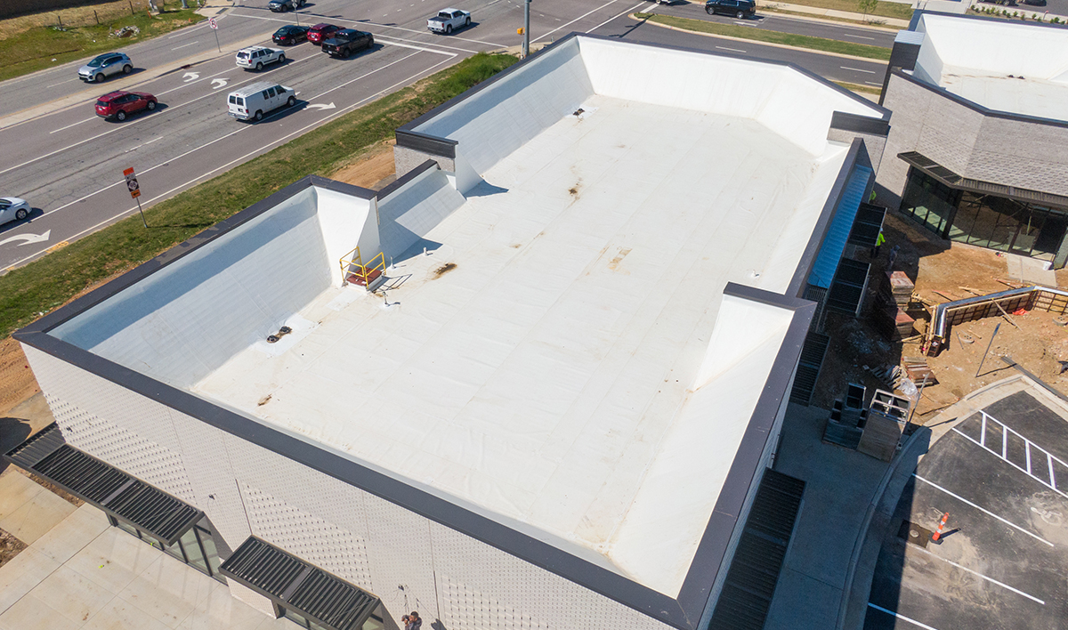 Drone Images Of TPO Flat Commercial Roof With Metal Panels: New