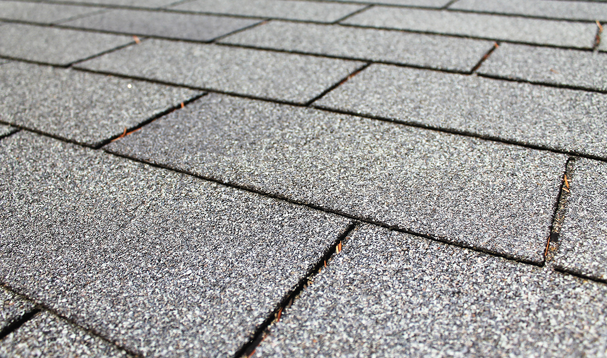 Closeup Of Asphalt Roofing Shingles Horizontal Background Textur