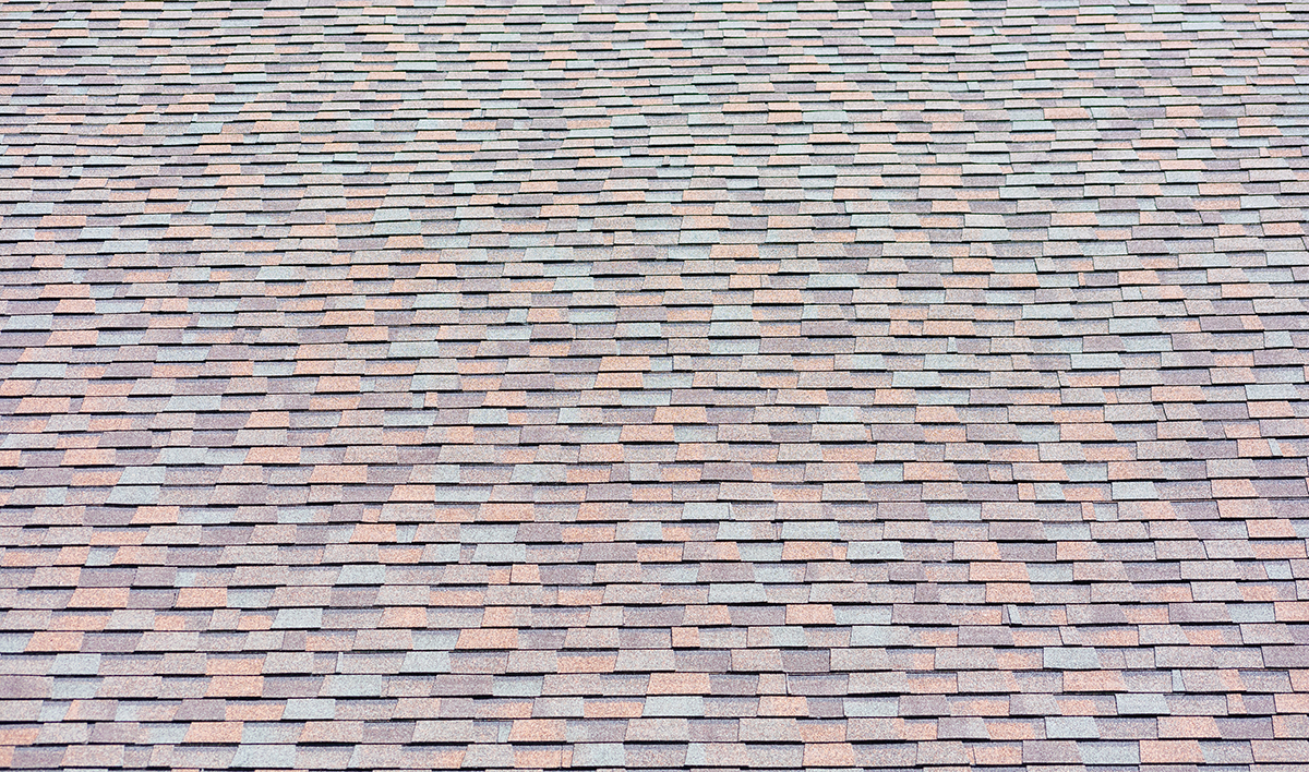 Laminated Architectural Roof Shingles With Ridge Shingle Of Different Shapes And Sizes Give The Rooftop Dimensional Appearance